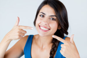 Portrait of beautiful with perfect smile. Isolated on white.